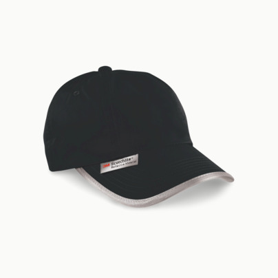 Kepsar med reflexband och fluorescerande färger